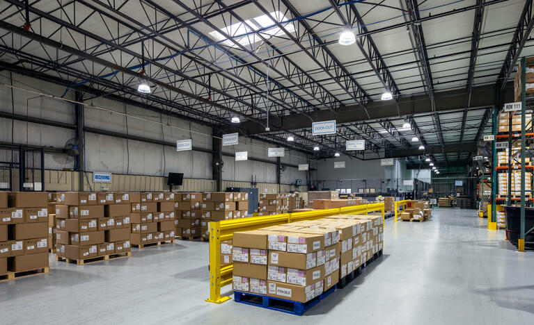 Warehouse space with high bay lighting and Lightcloud Blue controls. 
